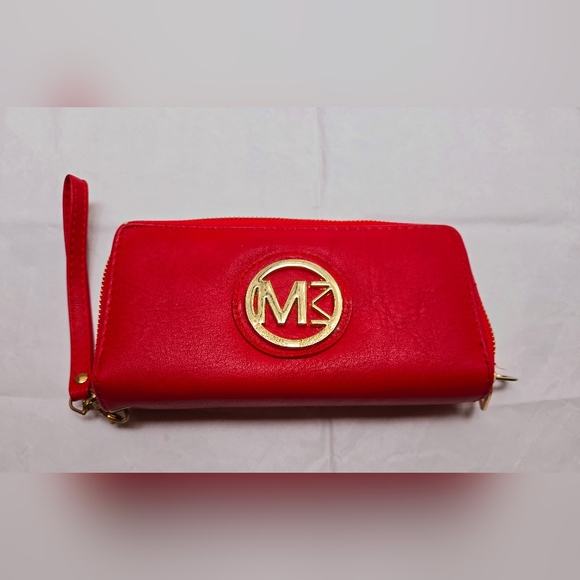 Red wallet with 2 zipper compartments and a wrist handle. - Picture 12 of 12